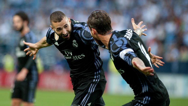 Real Madrid's Karim Benzema (L) celebrates a goal