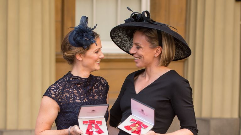 Former Great Britain hockey captain Kate Richardson-Walsh (right) and her wife Helen, at Buckingham Palace, London, after the investiture ceremony