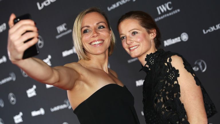 Hockey players Kate Richardson-Walsh (L) and Helen Richardson-Walsh take a selfie at the 2017 Laureus World Sports Awards in Monaco