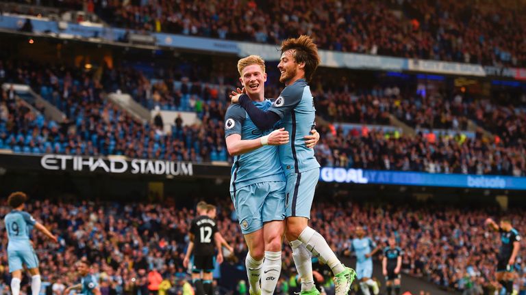 Kevin De Bruyne celebrates after scoring Manchester City's second goal with team-mate David Silva