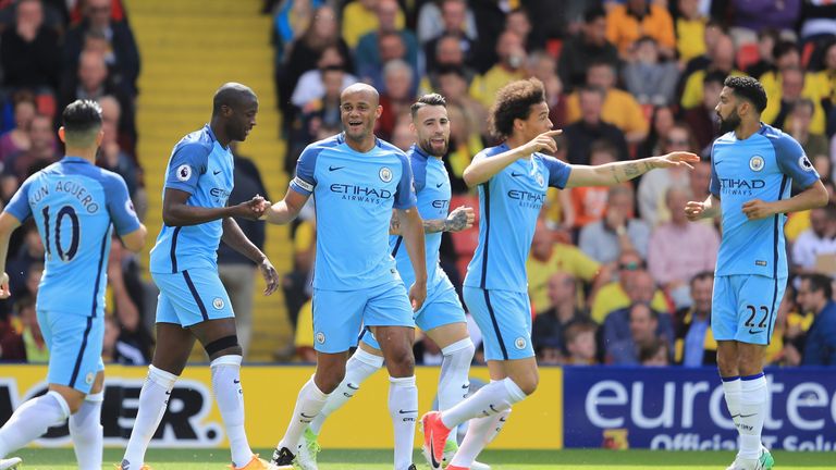 WATFORD, ENGLAND - MAY 21: Vincent Kompany of Manchester City celebrates scoring his sides first goal with his Manchester City team mates during the Premie