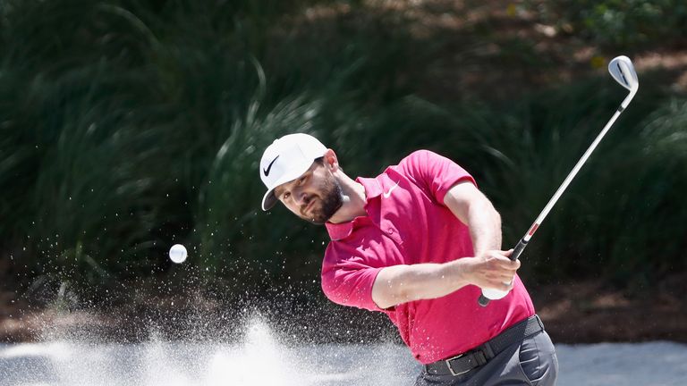 Kyle Stanley of the United States plays a shot from a bunker on the first hole during the final round of THE PLAYERS Championship