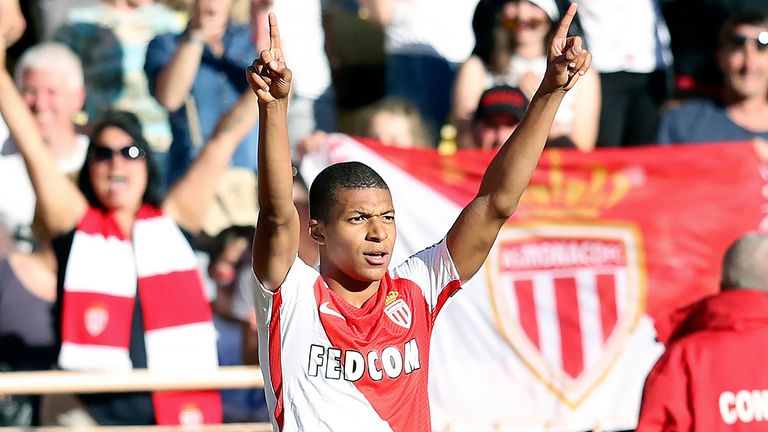 Kylian Mbappe celebrates after scoring during the Ligue 1 match against Toulouse on April 29