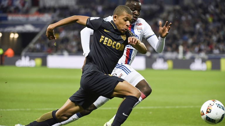 Kylian Mbappe and Mouctar Diakhaby in action during the Ligue 1 match between Olympique Lyonnais and AS Monaco