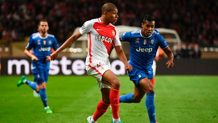 Kylian Mbappe runs with the ball against Juventus