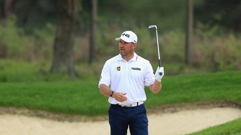 Lee Westwood of England plays from a bunker on the 9th hole during day three of the BMW PGA Championship at Wentworth 
