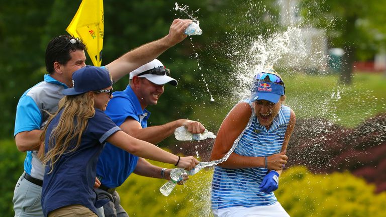 Lexi Thompson celebrates a first win of the year