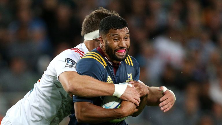 DUNEDIN, NEW ZEALAND - FEBRUARY 24: Lima Sopoaga of the Highlanders tries to break a tackle during the round one Super Rugby match between the Highlanders 