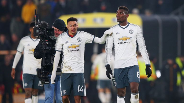 Jesse Lingard (left) says no-one can get near Paul Pogba in midfield