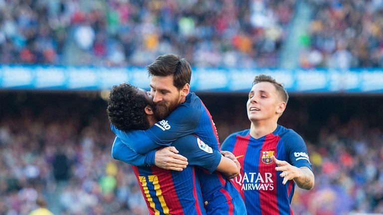 Lionel Messi celebrates with Neymar after Barcelona regain the lead