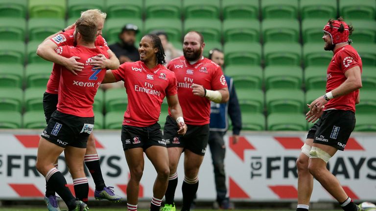 MELBOURNE, AUSTRALIA - MAY 06:  Ross Cronje of the Lions celebrates a try during the round 11 Super Rugby match between the Rebels and the Lions at AAMI Pa