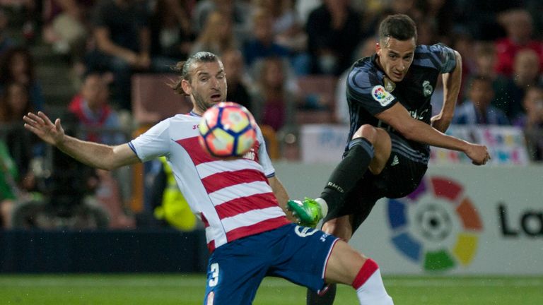 Real Madrid's Lucas Vazquez (right) shoots 