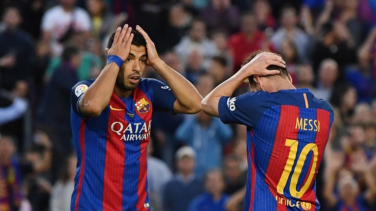 Luis Suarez and Lionel Messi show their frustration