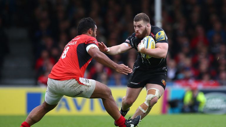 EXETER, ENGLAND - MAY 20:  Luke Cowan-Dickie of Exeter Chiefs hands off Billy Vunipola of Saracens during the Aviva Premiership semi final match between Ex