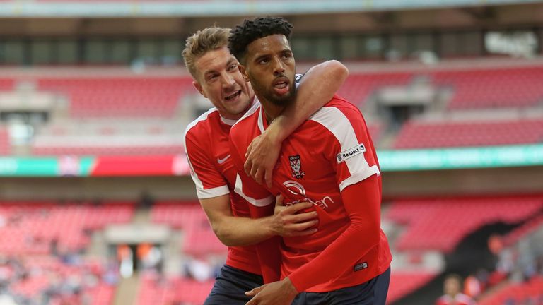 LONDON, ENGLAND - MAY 21:  Vadaine Oliver of York City celebrates scoring his teams second goal with teammate Simon Heslop during the Buildbase FA Trophy F
