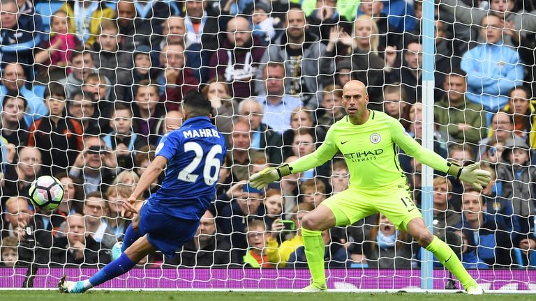 Riyad Mahrez scores his penalty which is later disallowed for taking two touches