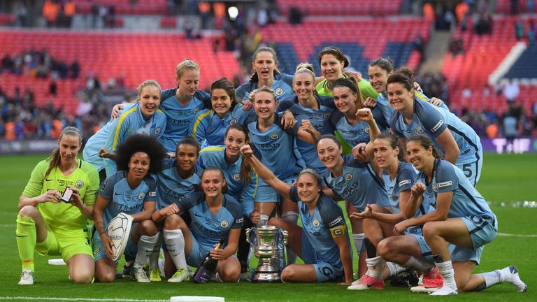LONDON, ENGLAND - MAY 13:  The Man City Ladies team pose for a photo with the trophy after they won the SSE Women's FA Cup Final between Birmingham City La