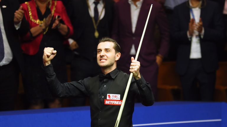 Mark Selby celebrates his victory over John Higgins in the World Snooker Championship final