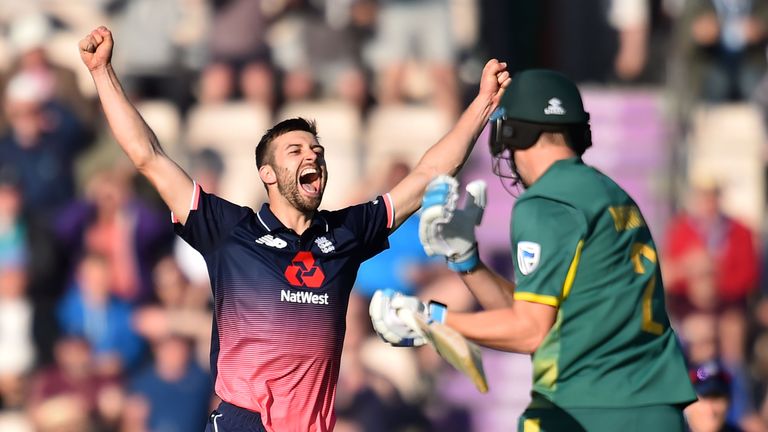 Mark Wood (L) celebrates as England win by two runs at the second ODI against South Africa in Southampton