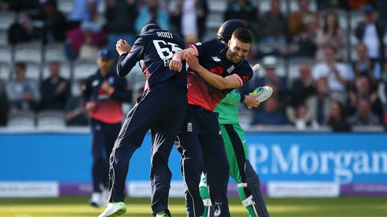 Mark Wood and Joe Root celebrate after claiming the final Irish wicket and winning the second ODI at Lord's