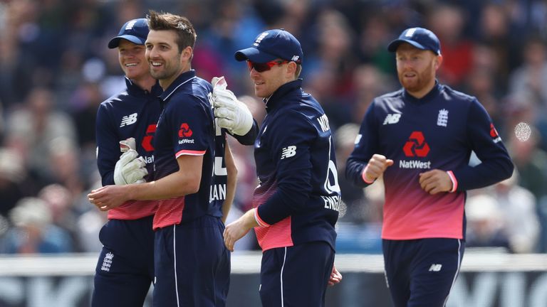 BRISTOL, ENGLAND - MAY 05:  Mark Wood (2L) celebrates with Sam Billings (L) and Eoin Morgan after taking the wicket of Paul Stirling of Ireland during the 