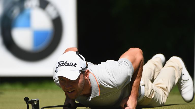 VIRGINIA WATER, ENGLAND - MAY 26:  Max Kieffer of Germany lines up on the 16th hole during day two of the BMW PGA Championship at Wentworth on May 26, 2017
