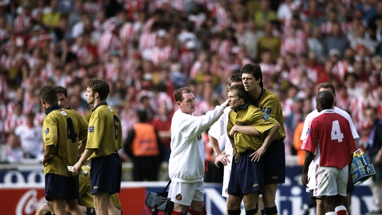 25 May 1998:  Michael Gray of Sunderland is consoled by his team mates after the Nationwide League Division One play-off final against Charlton Athletic at