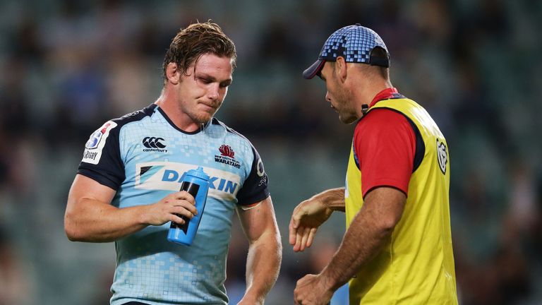 SYDNEY, AUSTRALIA - MAY 06:  Michael Hooper captain of the Waratahs talks to defence coach Nathan Grey during the round 11 Super Rugby match between the Wa