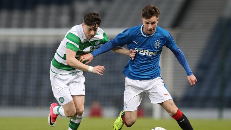 GLASGOW, SCOTLAND - APRIL 26:  Michael Johnston of Celtic vies with Josh Jeffries of Rangers during The Scottish FA Youth Cup Final between Celtic and Rang