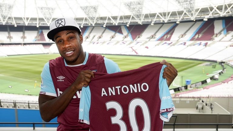 Michail Antonio poses for a photograph after signing a new contract with West Ham United