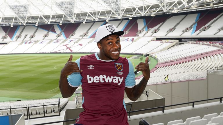 Michail Antonio poses for a photograph after signing a new contract with West Ham United