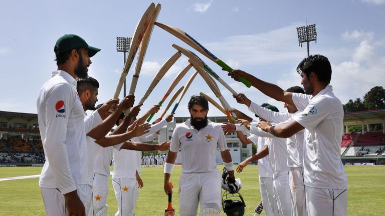 Misbah-ul-Haq receives a guard of honour from his team-mates