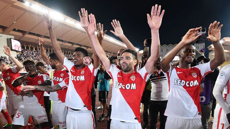 Monaco's players celebrate winning the French championship after winning the French L1 football match Monaco (ASM) vs St Etienne (ASSE) on May 17, 2017, at