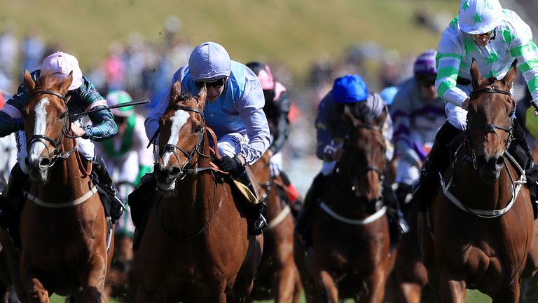 Montaly ridden by jockey Oisin Murphy (centre) on the way to winning the 188Bet Chester Cup 