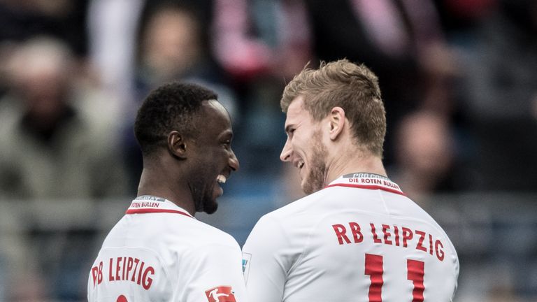 LEIPZIG, GERMANY - APRIL 15:  Naby Keita of Leipzig celebrates his team's third goal with team mate Timo Werner during the Bundesliga match between RB Leip
