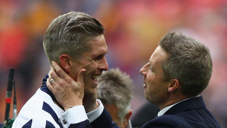 LONDON, ENGLAND - MAY 20:  Winning goalscorer Steve Morison of Millwall celebrates victory and promotion with Neil Harris manager of Millwall after the Sky