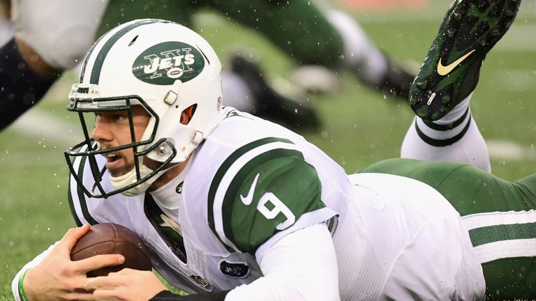 FOXBORO, MA - DECEMBER 24:  Bryce Petty #9  of the New York Jets is tackled during the first quarter of a game against the New England Patriots at Gillette