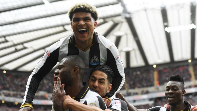 NEWCASTLE UPON TYNE, ENGLAND - MAY 07:  Chancel Mbemba of Newcastle United celebrates scoring his sides second goal with his Newcastle United team mates du