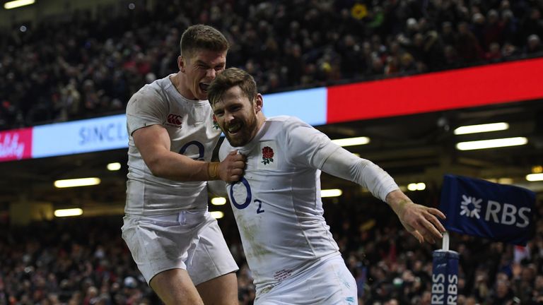 CARDIFF, WALES - FEBRUARY 11:  Elliot Daly of England is congratulated by teammate Owen Farrell (L) of England after scoring the match winning try during t
