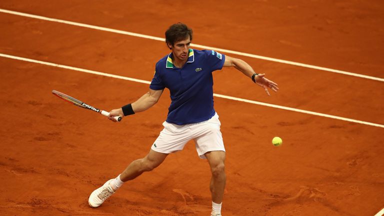 MADRID, SPAIN - MAY 12:  Pablo Cuevas of Uruguay in action against Alexander Zverev of Germany during day seven of the Mutua Madrid Open tennis at La Caja 