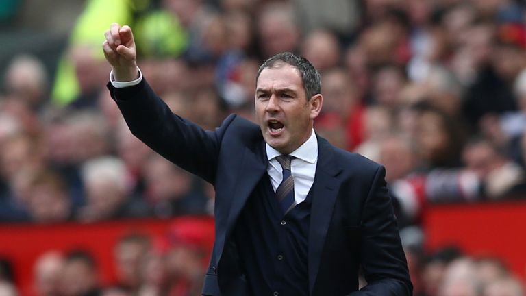 MANCHESTER, ENGLAND - APRIL 30: Paul Clement, Manager of Swansea City gives his team instructions during the Premier League match between Manchester United