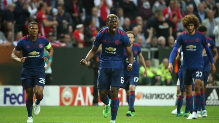 Manchester United's French midfielder Paul Pogba (C) celebrates after scoring during the UEFA Europa League final football match Ajax Amsterdam v Mancheste