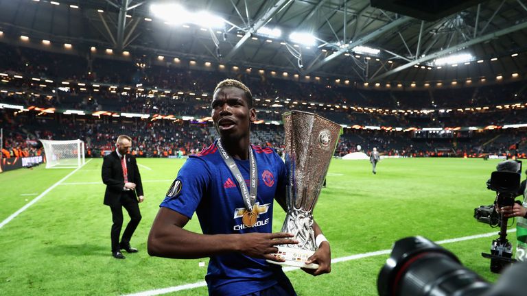 Paul Pogba of Manchester United celebrates with The Europa League trophy 