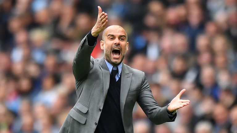Pep Guardiola shouts from the touchline during the match at the Etihad Stadium