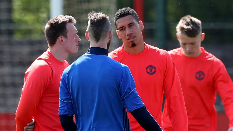 Phil Jones (left), David de Gea and Chris Smalling during a training session at the AON Complex