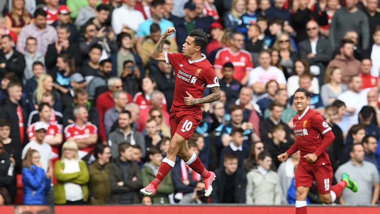 Liverpool's Brazilian midfielder Philippe Coutinho celebrates scoring his team's second goal during the English Premier League football match between Liver