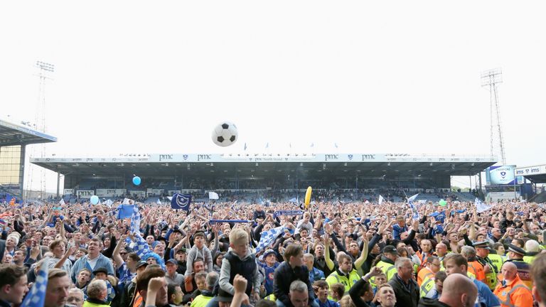 PORTSMOUTH, ENGLAND - MAY 6: Fans are seen on the pitch after the Sky Bet League Two match between Portsmouth and Cheltenham Town at Fratton Park on May 6,
