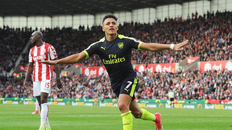 Alexis Sanchez wheels away from goal after extending Arsenals lead