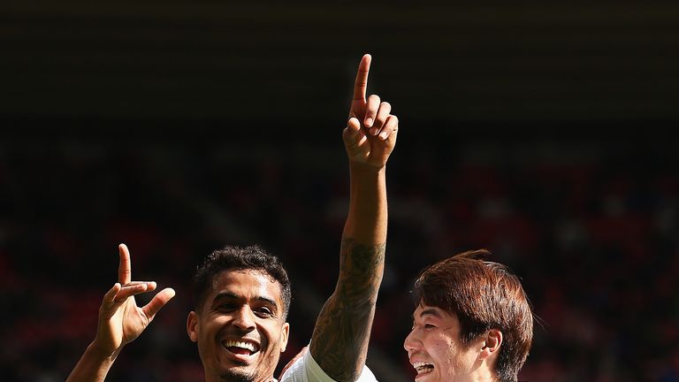 Kyle Naughton celebrates scoring Swansea's second with Ki Sung-Yueng