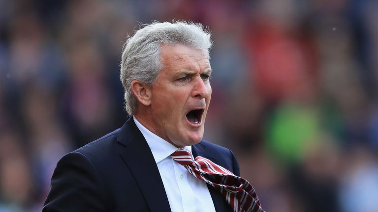 Mark Hughes shouts to his players in the match against Arsenal at the Bet365 Stadium